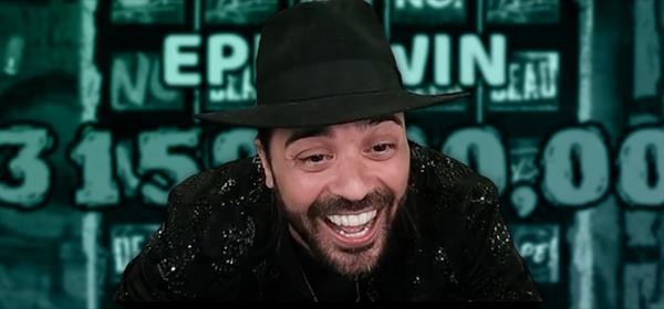 man in black hat smiling