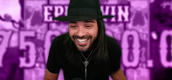 man in black hat smiling