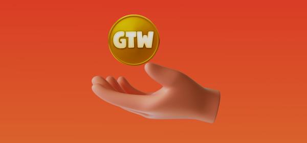 hand holding a gtw coin