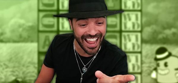man in black hat smiling 
